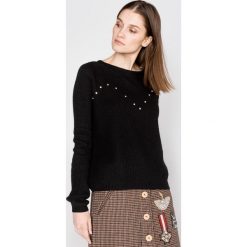Silvian Heach Nirgua Sweter Czarny. Czarne bluzy damskie Silvian Heach, m, z aplikacjami, z wełny, bez rękawów, bez kaptura. Za 438,95 zł.
