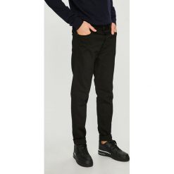 Jack & Jones - Jeansy. Czarne jeansy męskie Jack & Jones, z aplikacjami, z podwyższonym stanem. W wyprzedaży za 129,90 zł.