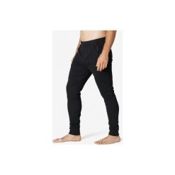 Spodnie dresowe Gym & Pilates 500 męskie. Czarne spodnie męskie NYAMBA, xs, bez wzorów, z elastanu. Za 59,99 zł.