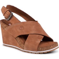 Sandały TIMBERLAND - Capri Sunset X-Band Sanda TB0A1WMUF13 Rust Nubuck. Pomarańczowe klapki damskie Timberland, bez wzorów, ze skóry, bez obcasa, na obcasie. W wyprzedaży za 369,00 zł.