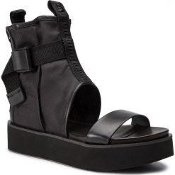 Sandały UNITED NUDE - Tech Bootie 104430112527 Black. Czarne klapki damskie marki United Nude, bez wzorów, ze skóry, bez obcasa. Za 799,00 zł.