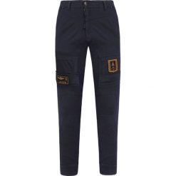 Spodnie AERONAUTICA MILITARE. Niebieskie spodnie męskie Aeronautica Militare, z aplikacjami, z bawełny, militarne. Za 1040,00 zł.