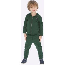 Mayoral - Spodnie dziecięce 92 - 134 cm. Żółte spodnie chłopięce Mayoral, bez wzorów, z elastanu, sportowe, z obniżonym stanem. W wyprzedaży za 89,90 zł.