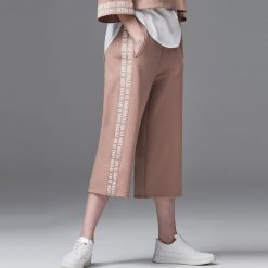 Spodnie dresowe damskie: Dresowe spodnie culotte – Kremowy
