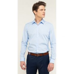 Koszula Boss Eliot 50427520. Niebieskie koszule męskie Boss, m, bez wzorów, z bawełny, casualowe, bez kołnierzyka, bez rękawów. W wyprzedaży za 259,00 zł.