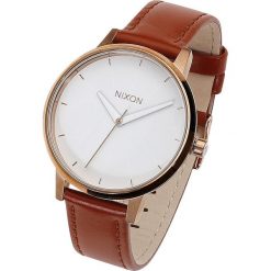 Nixon Kensington Leather - Rose Gold / White Zegarek na rękę jasnobrązowy. Pomarańczowe zegarki damskie marki Nixon, ze stali. Za 527,90 zł.