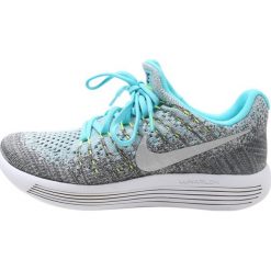 Nike Performance LUNAREPIC FLYKNIT 2 Obuwie do biegania treningowe wolf grey/metallic silver/polarized blue/volt/glacier ice/grey. Niebieskie buty do biegania damskie marki Nike Performance, z materiału. W wyprzedaży za 356,85 zł.