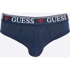 Guess Jeans - Slipy. Niebieskie slipy męskie marki Guess Jeans, s, z aplikacjami, z elastanu. W wyprzedaży za 59,90 zł.