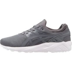 Asics Tiger GELKAYANO TRAINER EVO Tenisówki i Trampki carbon. Czarne trampki i tenisówki damskie marki Asics Tiger, z tworzywa sztucznego. W wyprzedaży za 189,50 zł.