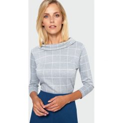 Bluzka dzianinowa w kratę. Bluzki damskie e-margeritka.pl, na jesień, bez wzorów, z poliesteru, eleganckie, ze stójką, bez rękawów. Za 99,99 zł.