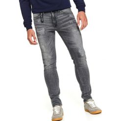 Spodnie denim z przetarciami dopasowane. Szare spodnie męskie Top Secret, na zimę, s, bez wzorów, z jeansu, eleganckie. W wyprzedaży za 79,99 zł.
