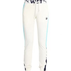 Fenty PUMA by Rihanna FITTED TRACK PANT Spodnie treningowe vanilla ice. Białe spodnie damskie marki Fenty PUMA by Rihanna, xs, z bawełny. Za 719,00 zł.