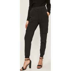 Answear - Spodnie. Czarne spodnie damskie ANSWEAR, s, bez wzorów, z bawełny, casualowe. Za 129,90 zł.