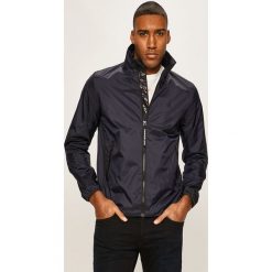 Calvin Klein Jeans - Kurtka. Niebieskie płaszcze męskie Calvin Klein Jeans, s, bez wzorów, z elastanu, krótkie, bez kaptura. W wyprzedaży za 479,90 zł.