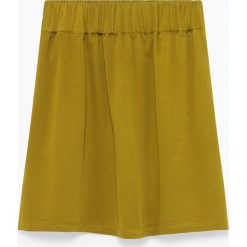 Spódnica "Dalida" w kolorze khaki. Brązowe spódniczki damskie American Vintage, xs, bez wzorów, z wiskozy, mini, rozkloszowane. W wyprzedaży za 150,95 zł.