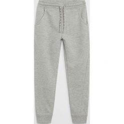 Mango Kids - Spodnie dziecięce Jumbo 110-164 cm. Szare spodnie chłopięce Mango Kids, bez wzorów, z bawełny. Za 69,90 zł.