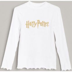 Koszulka z napisem Harry Potter - Kremowy. Białe koszulki damskie Reserved, z napisami, bez kołnierzyka, bez rękawów. Za 39,99 zł.