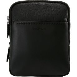 Calvin Klein MULTI TASK P FLAT CROSSOVER TECH Torba na ramię black. Czarne torby na ramię męskie marki Calvin Klein, na ramię, małe. Za 379,00 zł.