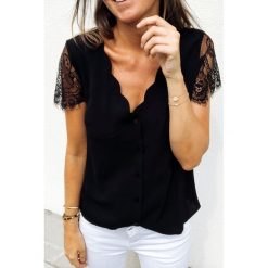 Damska bluzka TARINA BLACK. Czarne bluzki damskie Damska bluzka TARINA BLACK, s, bez wzorów, bez kołnierzyka, bez rękawów. W wyprzedaży za 49,00 zł.
