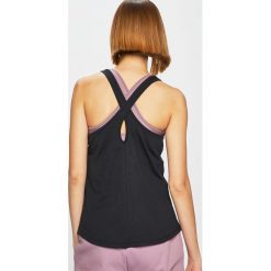 Under Armour - Top. Różowe topy damskie marki Under Armour, s, z bawełny, z okrągłym kołnierzem. Za 79,90 zł.