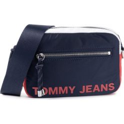Saszetka nerka TOMMY JEANS - Tjw Item Crossover Rwb AW0AW07150 0I1. Niebieskie nerki damskie Tommy Jeans, bez wzorów, z jeansu, młodzieżowe, bez dodatków. W wyprzedaży za 239,00 zł.