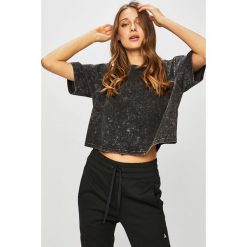 Reebok - Top. Czarne topy damskie Reebok, s, bez wzorów, z bawełny, z okrągłym kołnierzem. W wyprzedaży za 89,90 zł.