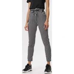 Czarne Spodnie Oaralin. Czarne jeansy damskie Born2be, xl. W wyprzedaży za 54,99 zł.