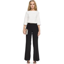 ELAINA Spodnie z szerokimi nogawkami - czarne. Czarne spodnie damskie Stylove, s, z elastanu, eleganckie, z podwyższonym stanem. Za 159,00 zł.