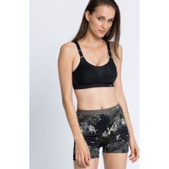 Triumph - Biustonosz Triaction Extreme Lite N. Szare biustonosze bardotka Triumph, z haftami, z elastanu. Za 189,90 zł.