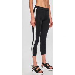 Calvin Klein Jeans - Legginsy. Czarne spodnie damskie Calvin Klein Jeans, s, bez wzorów, z elastanu. W wyprzedaży za 219,90 zł.