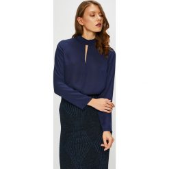 Trendyol - Bluzka. Niebieskie bluzki damskie marki Trendyol, na co dzień, bez wzorów, z poliesteru, casualowe, z golfem, bez rękawów. W wyprzedaży za 69,90 zł.