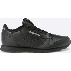 Reebok Classic - Buty dziecięce Classic. Czarne trampki chłopięce Reebok Classic, bez wzorów, ze skóry, sportowe, z okrągłym noskiem, bez zapięcia. Za 249,90 zł.