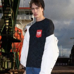 Koszulka z kolekcji Heritage - Czarny. Koszulki męskie Cropp. W wyprzedaży za 19,99 zł.