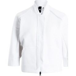 Adidas Performance TRANS Bluza rozpinana white. Białe bluzy rozpinane damskie marki adidas Performance, m, z bawełny. W wyprzedaży za 359,20 zł.