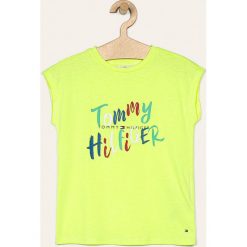 Tommy Hilfiger - T-shirt dziecięcy 110-176 cm. Żółte bluzki dziewczęce TOMMY HILFIGER, z nadrukiem, z bawełny, z okrągłym kołnierzem, z krótkim rękawem, krótkie, bez kaptura. Za 159,90 zł.
