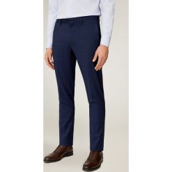 Mango Man - Spodnie Paulo. Niebieskie spodnie męskie Mango Man, na co dzień, bez wzorów, z elastanu. Za 229,90 zł.