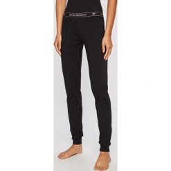 Emporio Armani - Spodnie piżamowe. Czarne piżamy damskie Emporio Armani, s, bez wzorów, z elastanu, bez rękawów. W wyprzedaży za 179,90 zł.