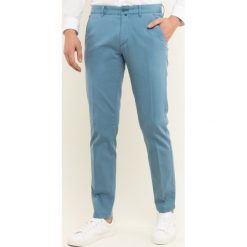 Spodnie materiałowe Marc O'Polo M21 0108 10064. Niebieskie jeansy męskie Marc O'Polo, m, bez wzorów. W wyprzedaży za 269,00 zł.