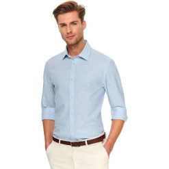 Koszula lniana o kroju slim. Niebieskie koszule męskie Top Secret, na lato, m, bez wzorów, z materiału, eleganckie, z klasycznym kołnierzykiem, bez rękawów. W wyprzedaży za 59,99 zł.