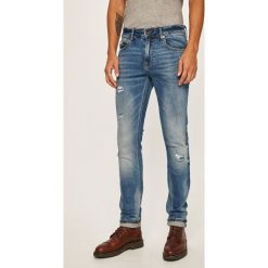Guess Jeans - Jeansy Chris. Niebieskie jeansy męskie Guess Jeans, s, z aplikacjami. Za 459,90 zł.