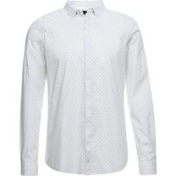 Armani Exchange Koszula white. Białe koszule męskie Armani Exchange, xl, bez wzorów, z elastanu, bez kołnierzyka, bez rękawów. Za 379,00 zł.
