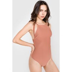Calvin Klein Kostium kąpielowy jednoczęściowy Beżowy. Brązowe stroje kąpielowe damskie Calvin Klein, s, bez wzorów, z elastanu. Za 628,95 zł.