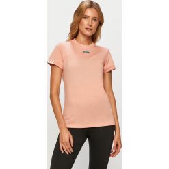 Adidas Originals - T-shirt. Różowe topy damskie adidas Originals, z aplikacjami, z bawełny, casualowe, z okrągłym kołnierzem. Za 119,90 zł.