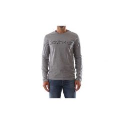 T-shirty z długim rękawem Calvin Klein Jeans K10K102692 COTTON LOGO LS. Szare t-shirty męskie Calvin Klein Jeans, xl, bez wzorów, z jeansu, bez kołnierzyka, długie. W wyprzedaży za 191,46 zł.