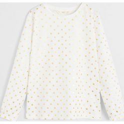 Mango Kids - Longsleeve dziecięcy Golden 110-164 cm. Białe bluzki dziewczęce Mango Kids, bez wzorów, z bawełny, z okrągłym kołnierzem, z krótkim rękawem, krótkie, bez kaptura. Za 59,90 zł.