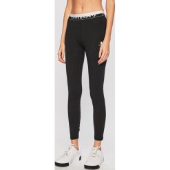 Converse - Legginsy. Czarne legginsy damskie Converse, xs, bez wzorów, z elastanu. W wyprzedaży za 99,90 zł.