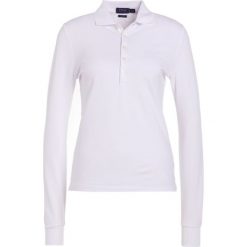 Polo Ralph Lauren JULIE SLIM FIT Koszulka polo white. Białe bluzki damskie marki Polo Ralph Lauren, xs, z elastanu. Za 459,00 zł.