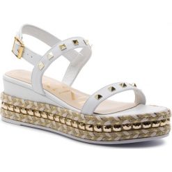 Espadryle CARINII - B4832 L46-000-000-A87. Białe espadryle damskie Carinii, bez wzorów, ze skóry, bez obcasa, na obcasie. W wyprzedaży za 269,00 zł.