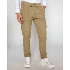 Scotch & Soda Spodnie Brązowy. Pomarańczowe spodnie męskie Scotch & Soda, bez wzorów, z bawełny. Za 498,95 zł.