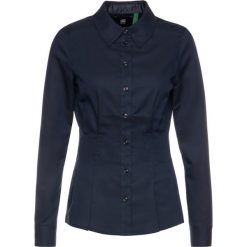 Koszula G-Star Raw Syenite D14588-9290-4213. Niebieskie bluzki damskie G-Star RAW, m, bez wzorów, z bawełny, retro, bez kołnierzyka, bez rękawów. W wyprzedaży za 239,00 zł.